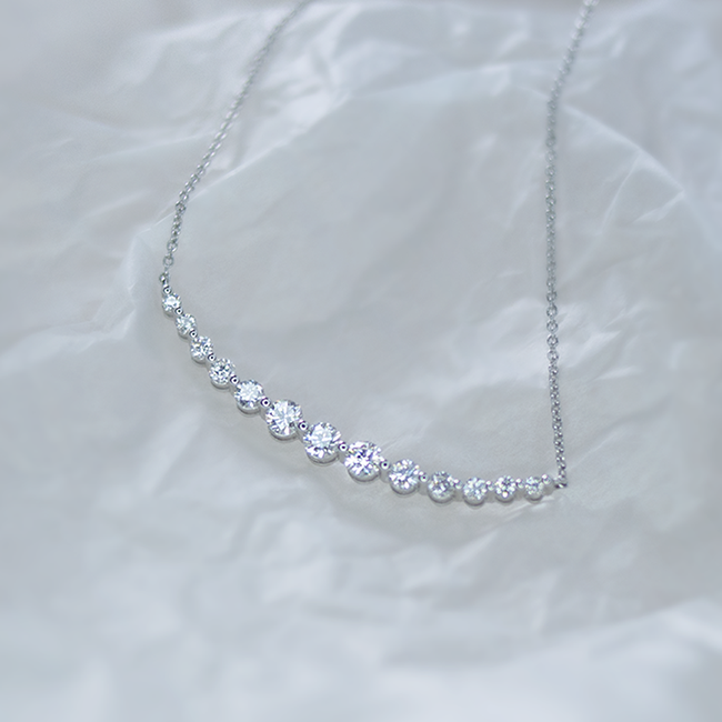 Curved diamond necklace